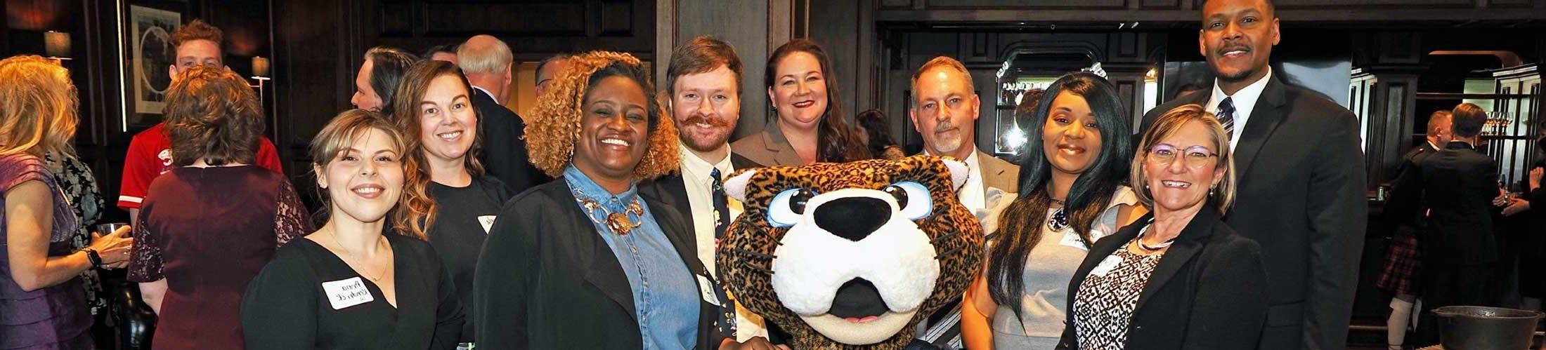 Group image from spring celebration with Mr. Paw