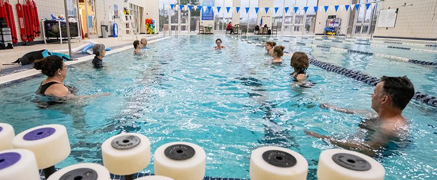 Water aerobic class in the indoor pool on campus.