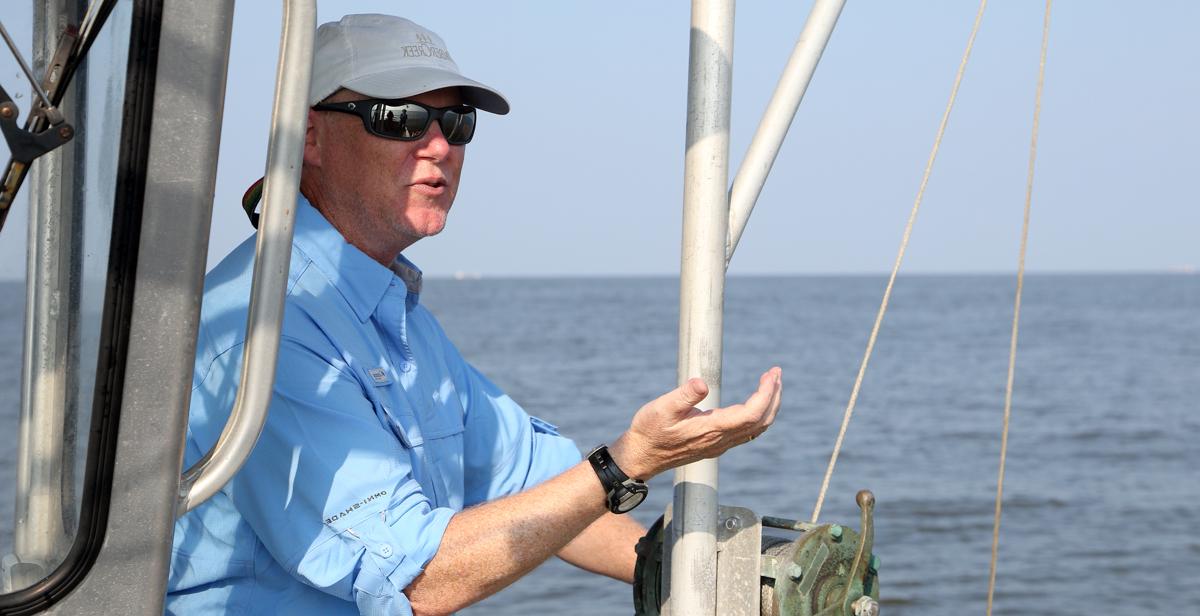 Professor of marine sciences Dr. John Lehrter, on a vessel off the Alabama coast in 2021, is leading a study to arrive at a baseline for water quality along the Alabama Gulf Coast. “At a really fundamental level, this project is about going out, very frequently, and trying to get the pulse of state water quality. Where are the places we have to worry about, and what are the places that have good quality?”