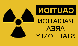 Caution sign for Radiation Area Staff Only